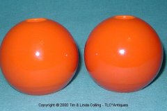 bennison_sphere_candlesticks_in_orange